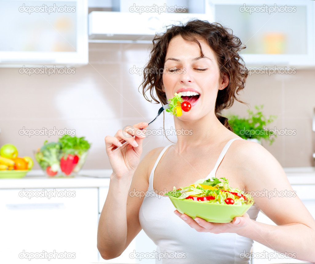 women laughing alone with salad know your meme depositphotos_14134473 Diet. Healthy Young Woman Eating Vegetable Salad women laughing alone with salad know your meme