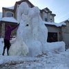 Another neighbors giant erect Tebow snowman