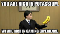 Satoru Iwata Holding Bananas