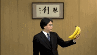 Satoru Iwata Holding Bananas