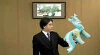 Satoru Iwata Holding Bananas