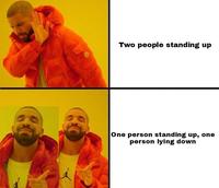 Two people standing up One person standing up, one person lying down
