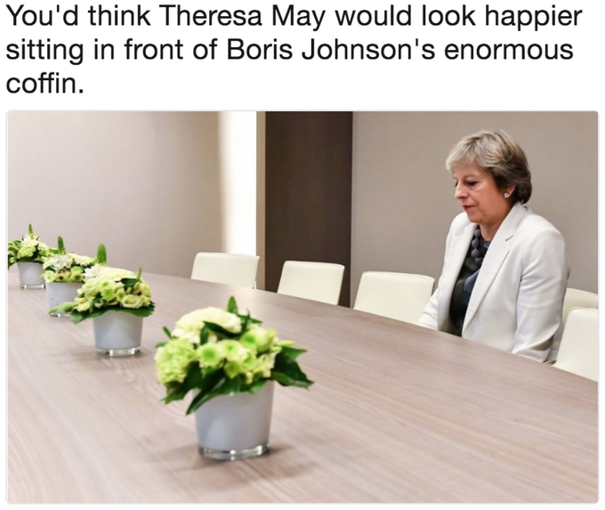 Lonely Theresa May meme joking that the table is a giant coffin of Boris Johnson Lonely Theresa May meme joking that the table is a giant coffin of Boris Johnson